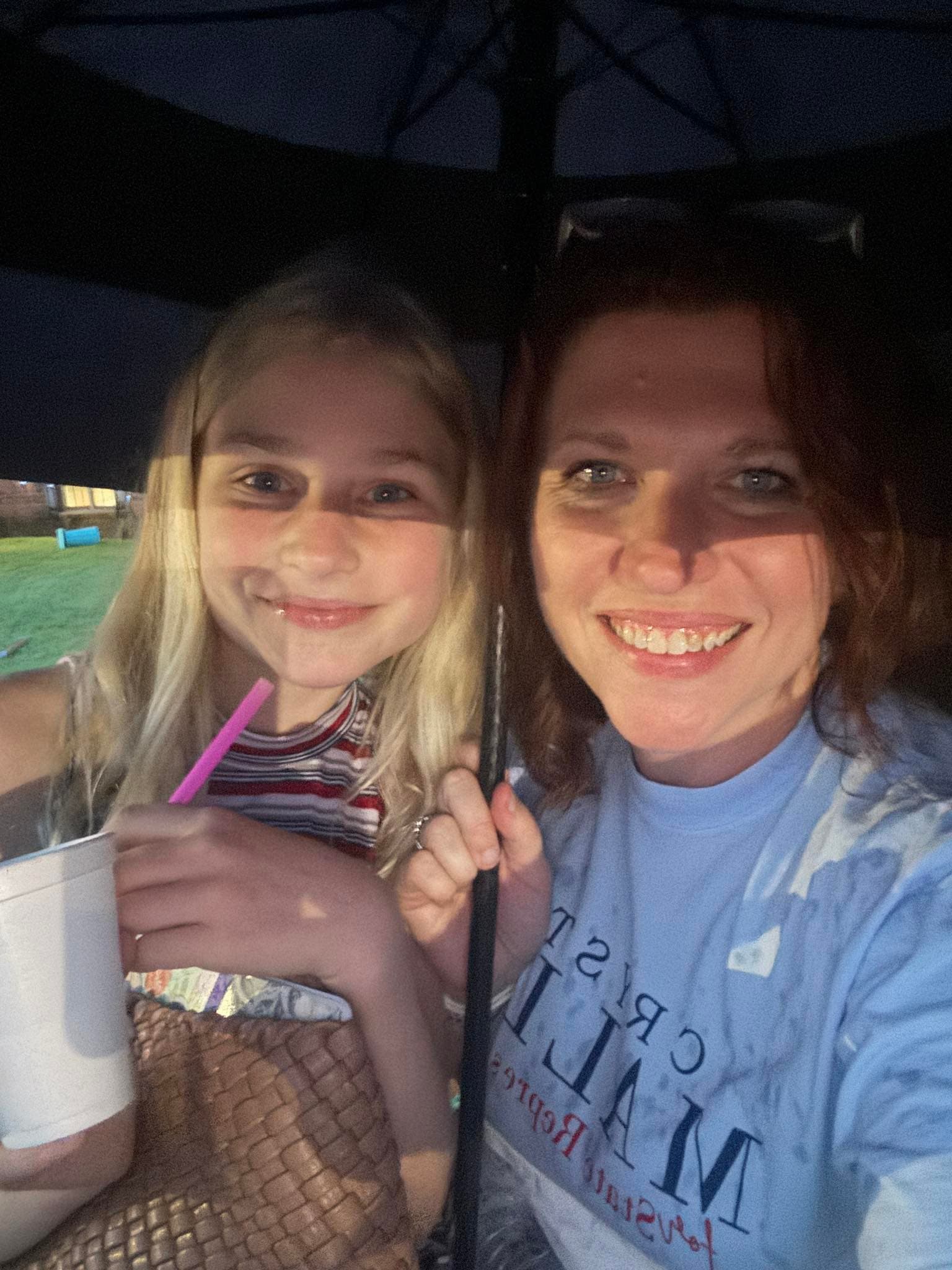 Crystal with daughter at community event